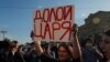 Russian Police Raid Homes Of Opposition Group Coordinators, Independent Lawmakers