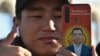  A supporter of Kyrgyz presidential candidate Sadyr Japarov attends a January 11, 2021 rally on Ala-Too Square in Bishkek, capital of Kyrgyzstan. 