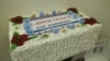 A cake from Ukrainian MP Ihor Kononenko for a village celebration is displayed at Kyiv's Museum of Election Trash.