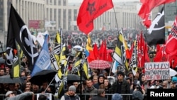 According to one NGO, about 9,000 people were in attendance at the start of the rally.
