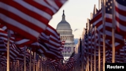 U.S. flags are seen on the National Mall in Washington, D.C. ahead of January 20, 2021 inauguration ceremonies for President-Elect Joe Biden and Vice President-Elect Kamala Harris. 