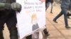 GRAB -'Dictatorship' -- Critics Slam Vote Enabling Putin To Run For President Again 