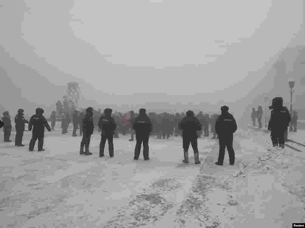 Police face off with protesters in Yakutsk, where reported January 23 temperatures were as low as -52 degrees Celsius (-62 degrees Fahrenheit). Thirteen detentions had occurred there by early afternoon, according to the non-governmental law-enforcement watchdog OVD-Info. 