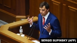 Ukraine's MP Oleksiy Honcharuk speaks during the first session of the country's new parliament on August 29.